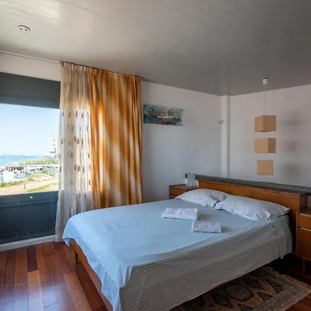 Red Beachfront Apartment